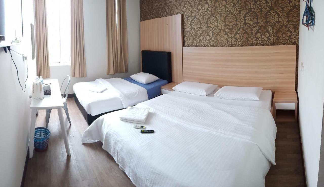 Hotel Truly Asia Kota Kinabalu Habitación foto